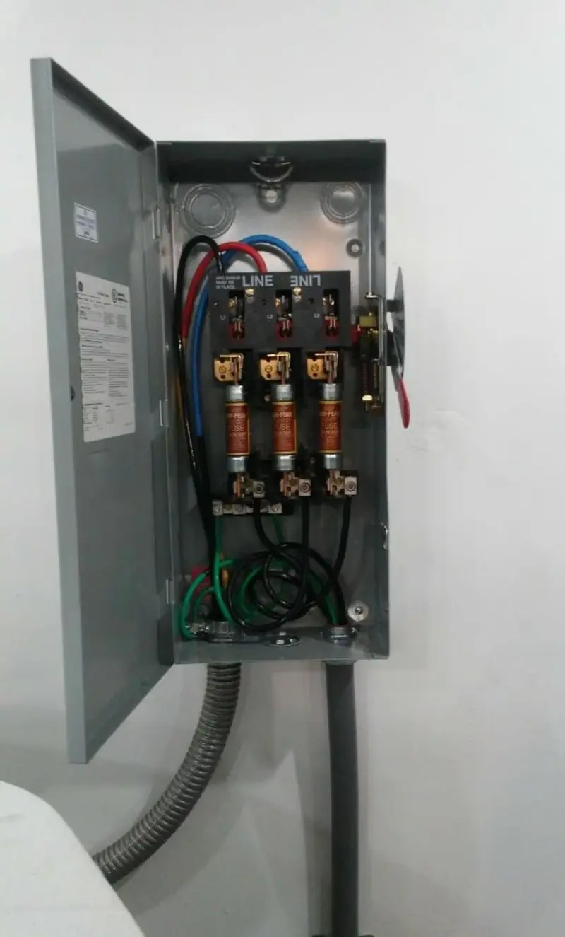 Three-phase disconnect switch installed for Smoke Detector Installation in Geneseo